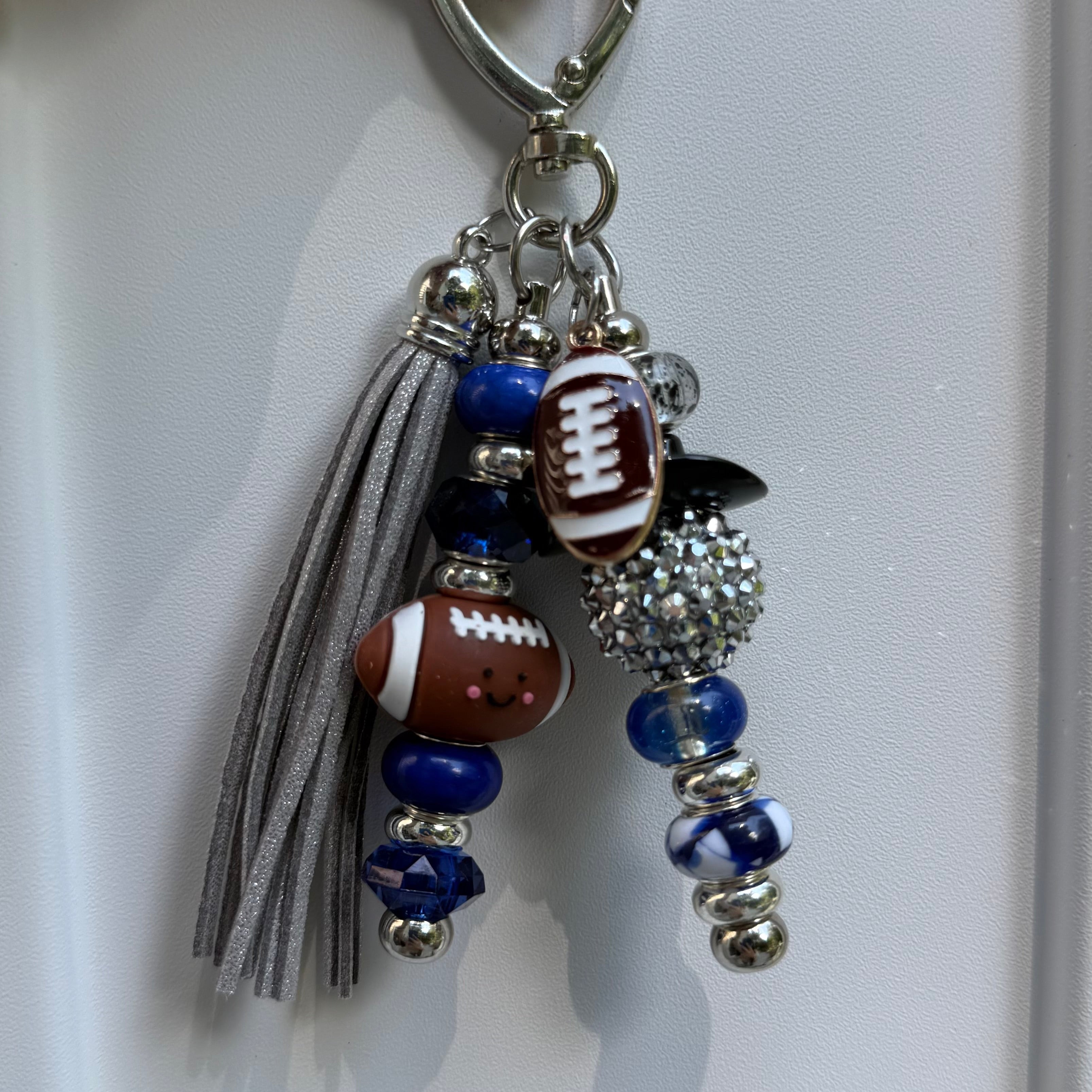 The NFL football bag charm