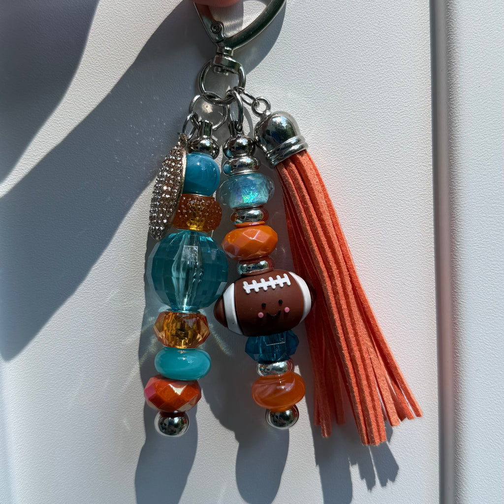 The NFL football bag charm