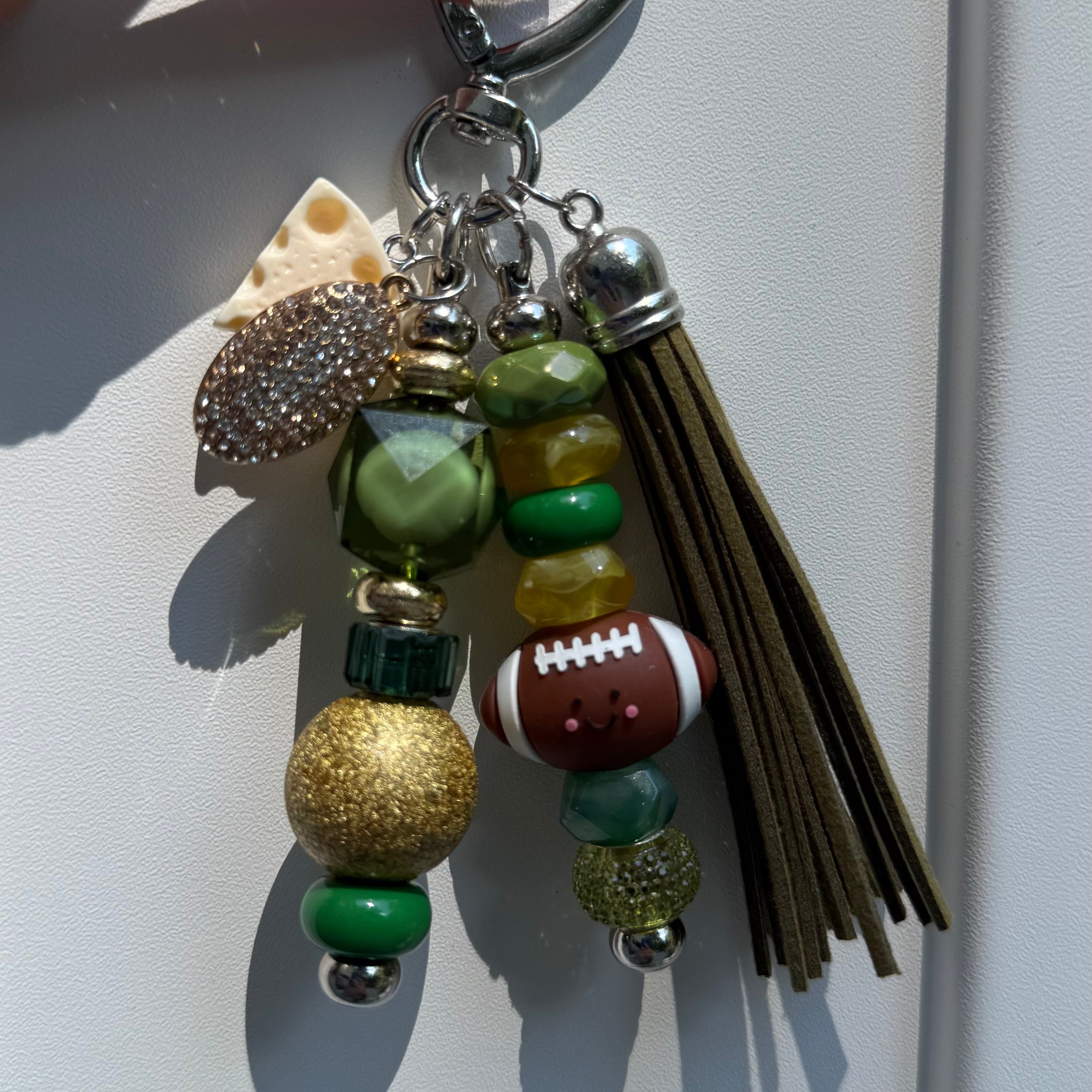 The NFL football bag charm