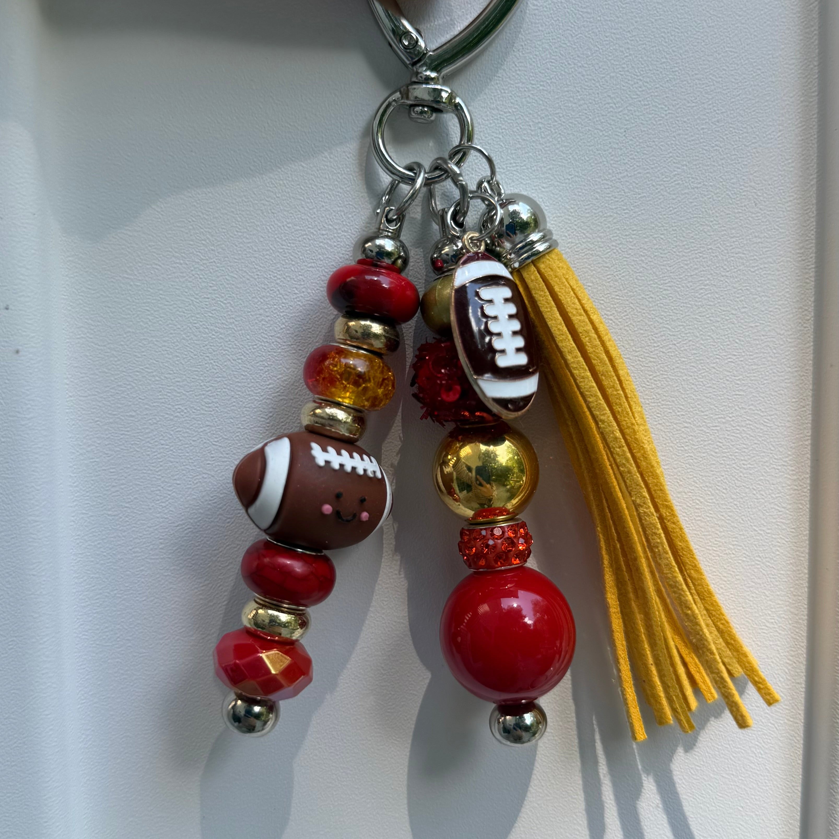 The NFL football bag charm
